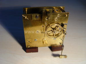 como arreglar un reloj de pared
